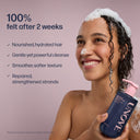 Woman with shampoo on head holding a bottle of UNOWE shampoo against a pink background