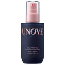 Blue bottle of UNOVE Silk Hair Oil with pink spray nozzle on a white background