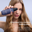 Woman holding a bottle of UNOM hair product with text about frizz control and sleekness.